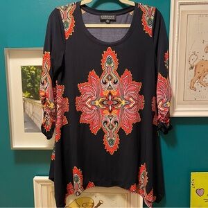 Context tunic knit top
